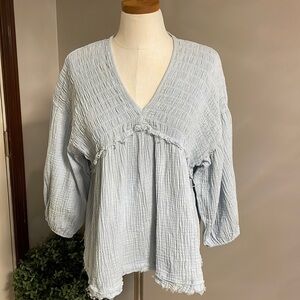 Altar’d state Smocked GAUZE solid baby blue babydoll top bubble / lantern slv L